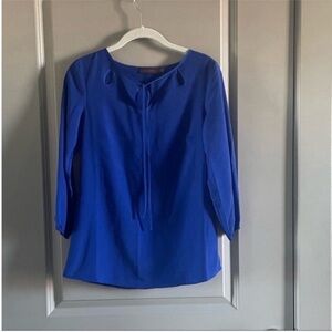 The Limited - blue blouse. 100% polyester. Only worn a few times.